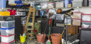 Residential garage full of junk